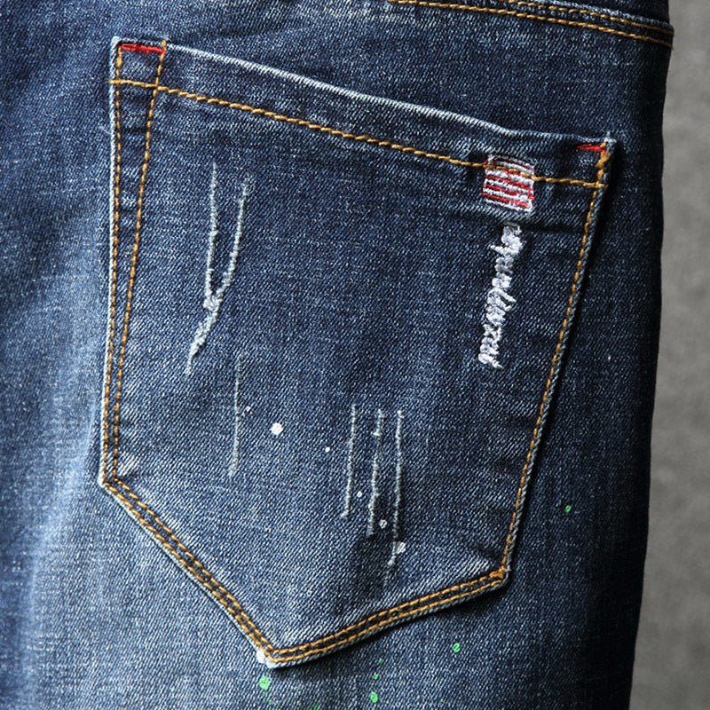 Herren Ripped Slim Fit Jeans mit kreativen Farbklecksen und modischem Destroyed-Look R&B