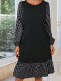 Damen elegantes Kleid mit modischen Punkteärmeln und Rüschendetail