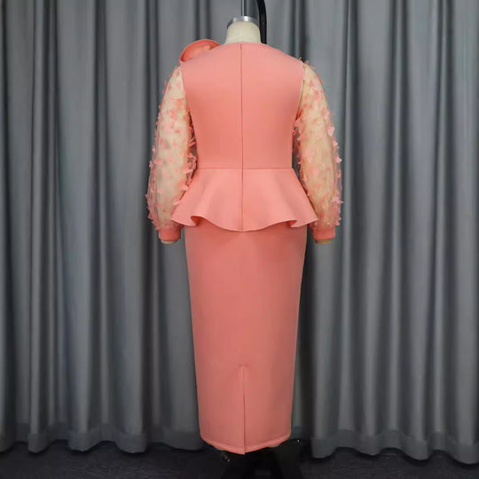 Damen Elegantes Kleid mit extravaganten Puffärmeln und floralem Detail R&B