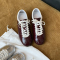 Damen modische Sneaker mit glänzender Oberfläche und robustem Design