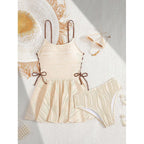 Damen Schwimmanzug mit modernem Wickelrock und eleganten Bändern R&B