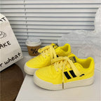 Damen Sneakers im sportlichen Retro-Stil mit trendigen Akzenten