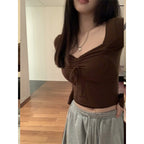 Damen Cropped Langarmshirt mit auffälligem Knoten-Detail