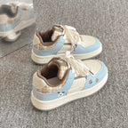 Damen Sneakers im verspielten Karo-Look mit Tiermotiven und bequemer Dämpfung