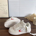 Damen Sportliche Sneakers mit einzigartigen Designelementen