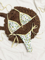 Damen Triangel-Bikini mit floralem Muster und verspieltem Design