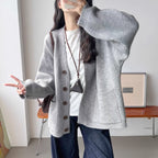 Damen Gemütliche Strickjacke mit großen Taschen und Knopfdetail