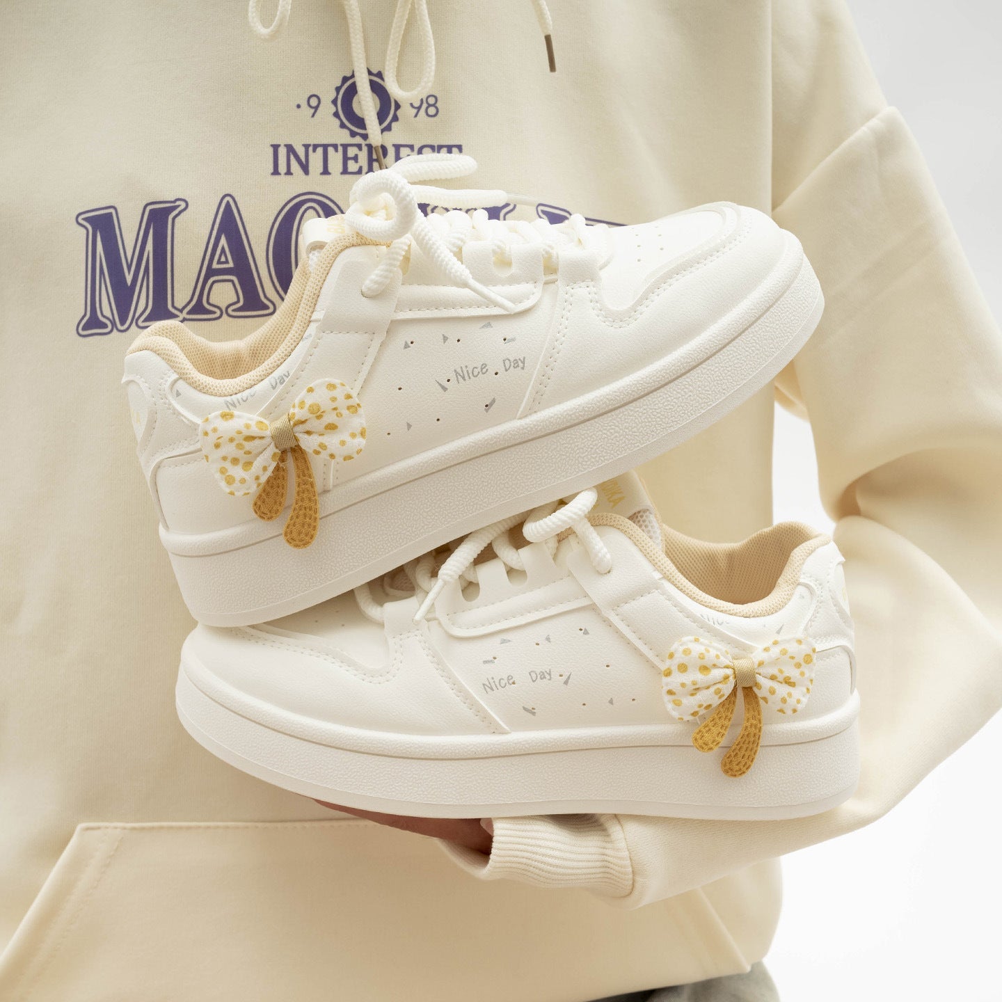 Damen Sneakers mit verspieltem Schleifenmotiv und schöner Applikation