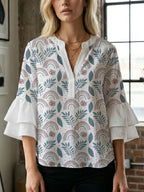 Damen Bluse mit voluminösen Flügelärmel und intensivem Blattmuster