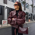 Damen oversized Kunstlederjacke mit statement-Manschetten R&B