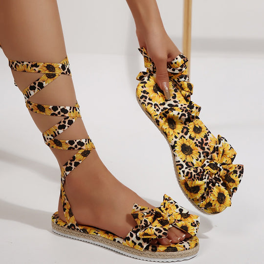 Damen Gladiator-Sandalen mit Blumendruck und Schleifenakzent R&B
