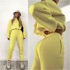 Damen Sportliches Set mit hochgeschlossenem Sweatshirt und elastischen Hosen