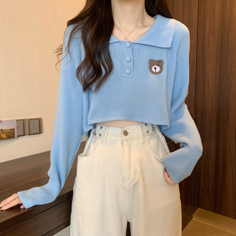 Damen Cropped Pullover mit einem Knopfverschluss und Einhorn-Emblem
