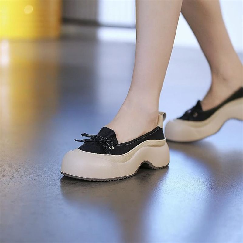 Damen Sleek Casual Slipper mit ausgeprägter Plateau-Sohle und modischem Bindegarn