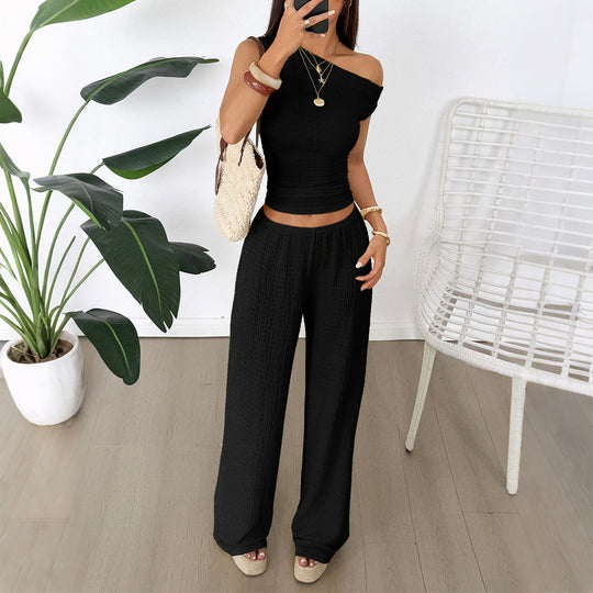 Damen Zweiteiliges Set aus elastischem Rippstoff mit asymmetrischem Top und weitem Hosen R&B