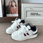 Damen Sportliche Sneakers im Retro-Look mit farblichen Akzenten