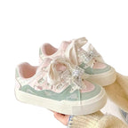 Damen Verspielte Sneakers mit dekorativem Schleifen-Design Heidi Mode