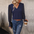 Damen Bluse mit transparenten Puffärmeln und V-Ausschnitt