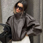 Damen nan oversized Bikerjacke Kunstlederoptik mit hohem Stehkragen, asymmetrischer Druckknopffront, Schulterriegeln und elastischem Saum R&B