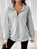 Damen Sweatshirt mit halbem Reißverschluss und lässigem Schnitt