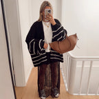 Damen Strickjacke mit voluminösen Ärmeln und modischen Streifen R&B