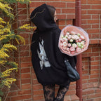 Damen Kapuzensweater mit kunstvollem Vogelmotiv und entspannter Passform