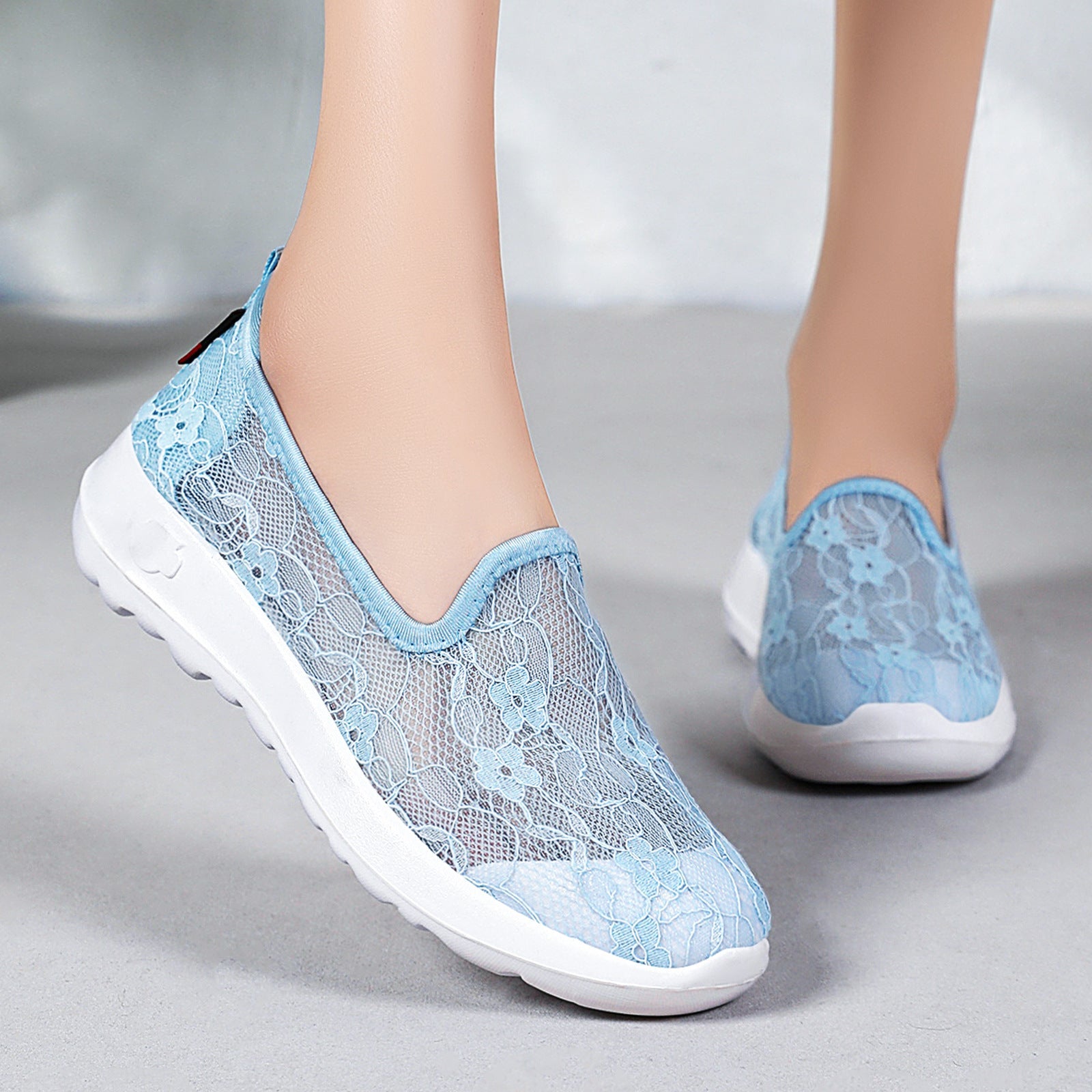 Damen Elegante und bequeme Slip-On Sneakers mit Spitzenoberfläche