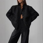 Damen Glitzerjacke mit praktischen Taschen und elastischem Saum
