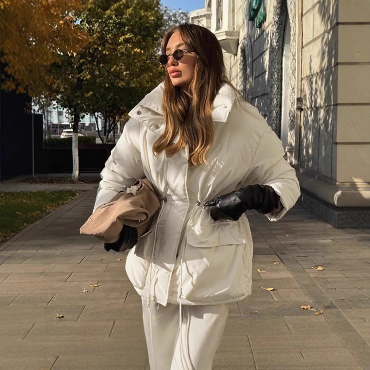 Oversized Daunenjacke Damen mit Taschen und Gürtel