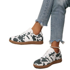 Damen Sportliche Sneakers mit trendigem Kuhdesign R&B