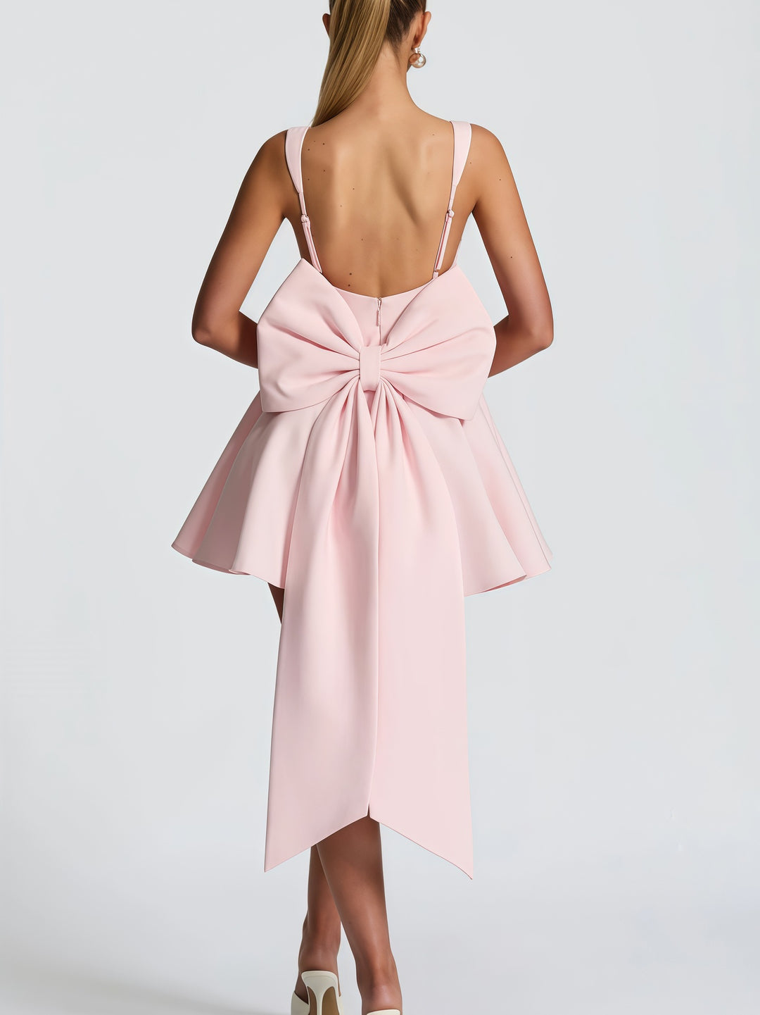 Damen Cocktailkleid mit oversized Schleifen-Design und fließendem Rock R&B