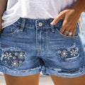 Damen Modische Destroyed Denim-Shorts mit floralem Design R&B