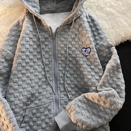 Damen Kapuzenjacke aus strukturiertem Material mit praktischen Taschen und modischem Design