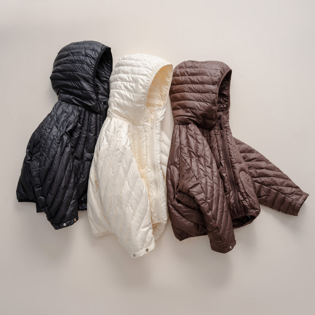 Damen gesteppte Jacke mit Kapuze und trendigem Design R&B