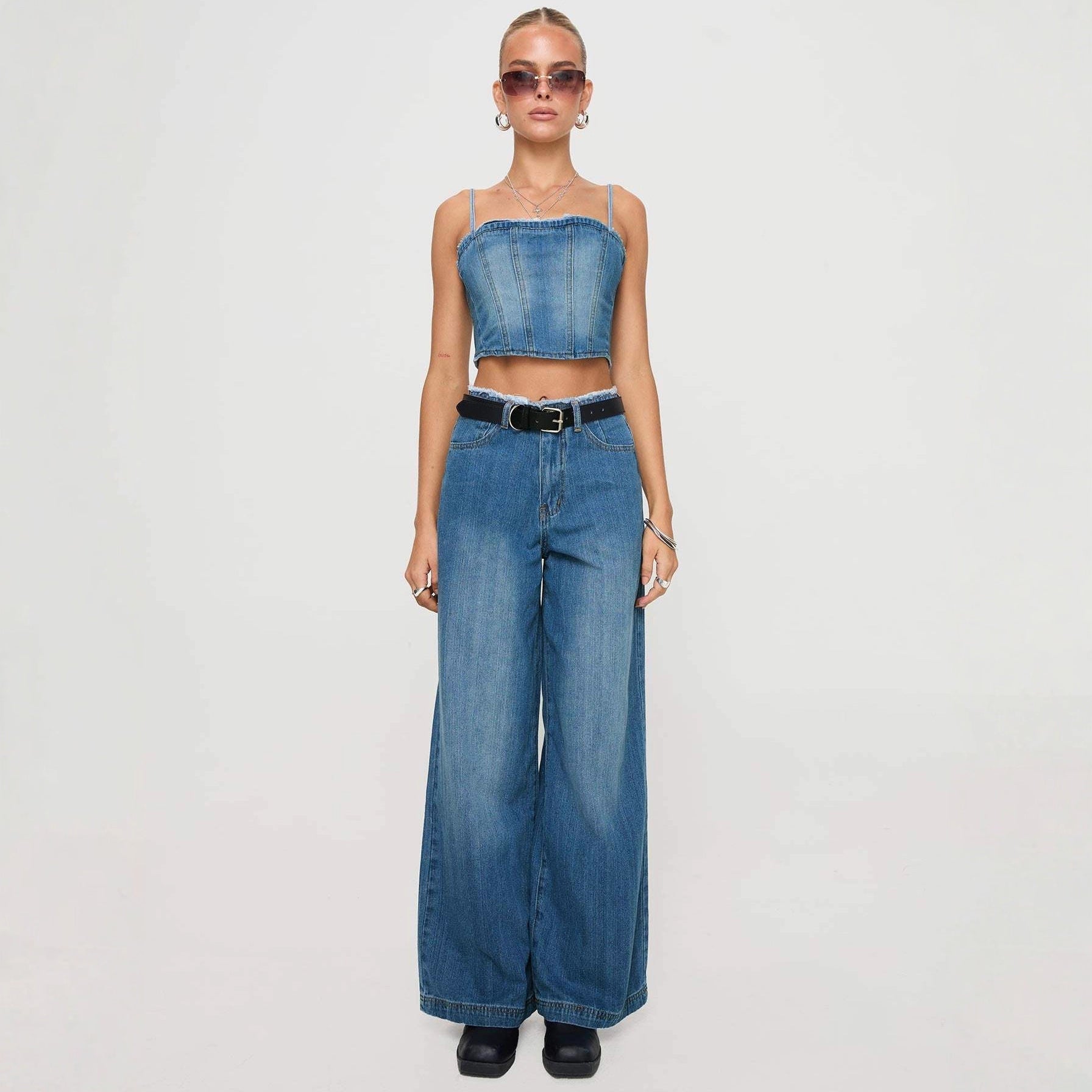 Damen Weite High-Waist Jeans mit fransigem Saum