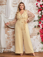Damen Jumpsuit mit funkelnden Verzierungen und transparenten Ärmeln R&B