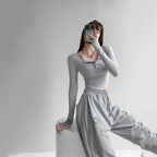 Damen Langarmshirt mit dekorativem Knopfdesign und lässigem Schnitt