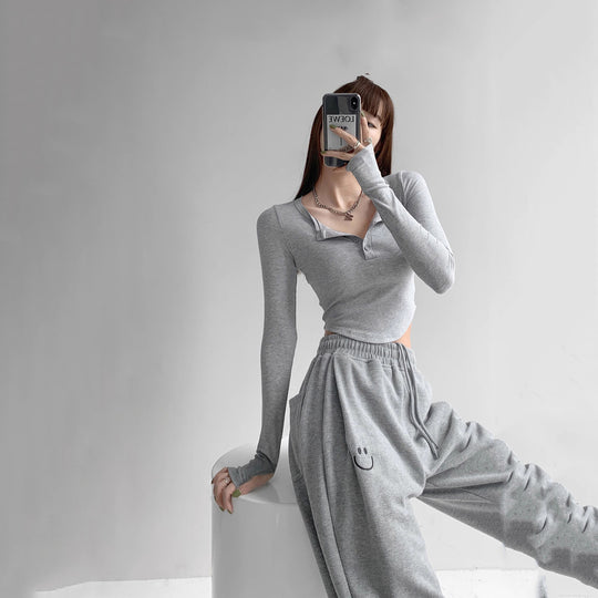 Damen Langarmshirt mit dekorativem Knopfdesign und lässigem Schnitt