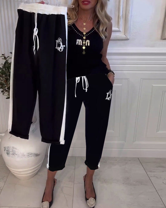 Damen nan Cropped-Jogginghose mit kontrastierendem Bund, seitlichem Zierstreifen, Kordelzug und Logostickerei R&B