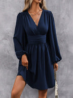 Damen Wickelkleid mit schickem V-Ausschnitt und voluminösen Ärmeln