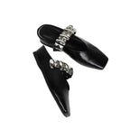 Damen Mules mit glamourösen Nieten und glänzender Oberfläche