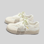Damen Freizeit Sneakers mit leichtem Punktemuster und verspielten Schleifen