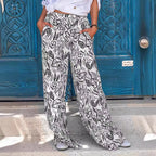 Damen Weit geschnittene Palazzo-Hose mit floralem Muster und elastischem Bund R&B