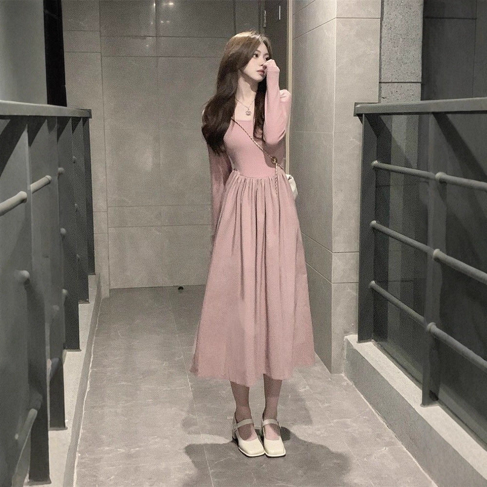 Damen langärmliges Midi-Kleid mit schwingendem Rock und dekorativen Puffärmeln