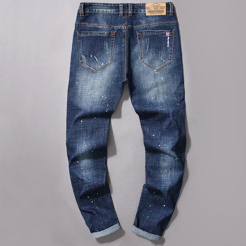 Herren modische Jeans mit kreativen Farbklecksen und Rissdesign R&B