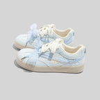 Damen Sneakers mit floralem Druck und innovativem Schnürsystem