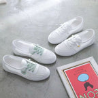 Damen lässige Sneaker mit buntem Blumenmotiv