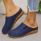 Damen Komfortable Clogs mit atmungsaktivem Leder-Obermaterial und elegantem Holz-Detail