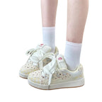 Damen Sneaker mit floralem Design und extra dicker Sohle