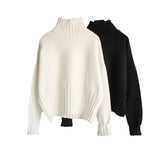 Damen Oversized Rollkragenpullover mit geschlitzten Ärmeln und Rippstruktur